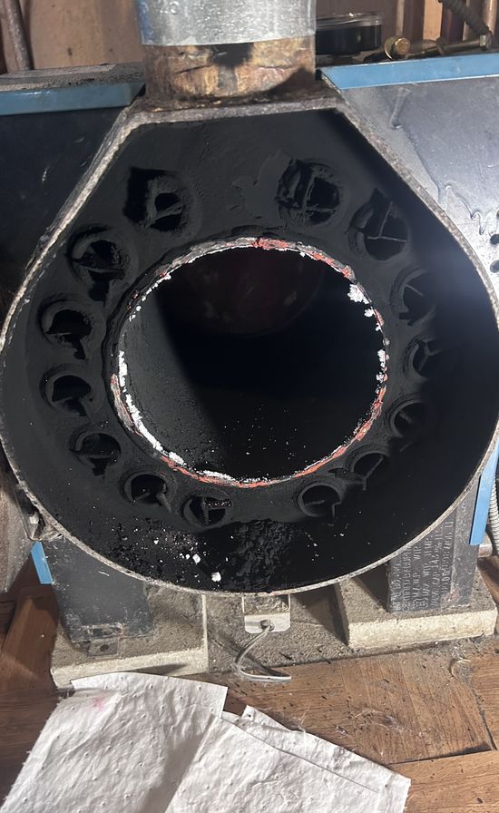 Sooted boiler before cleaning and maintenance