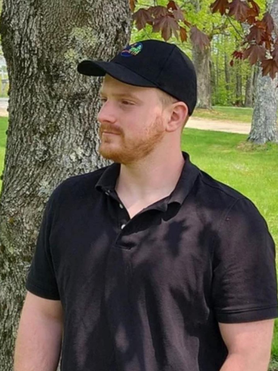 Ryan, owner of Homestyle Heating and Air, working on a home heating system